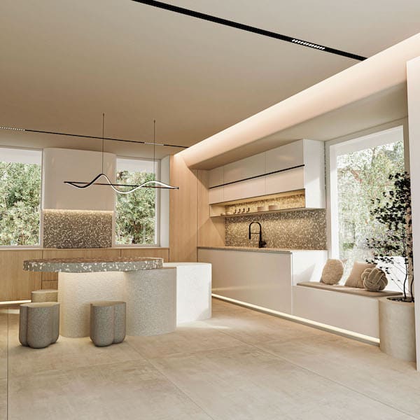 В тренде 2025 года – организация на кухне не просто места для приёма пищи, но и уютного пространства для общения Кухня в серо-бежевых тонах, встроенная мебель, стол и табуретки необычной формы